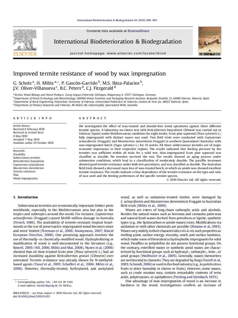 Improved termite resistance of wood by wax impregnation