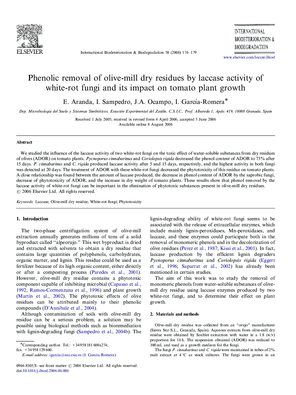 Phenolic removal of olive-mill dry residues by laccase activity of white-rot fungi and its impact on tomato plant growth