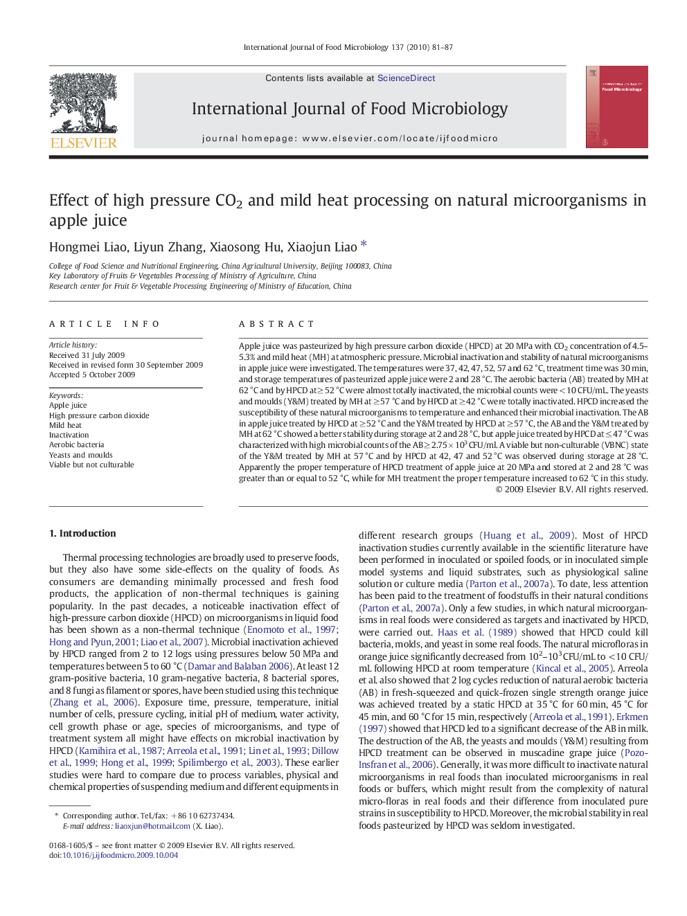 Effect of high pressure CO2 and mild heat processing on natural microorganisms in apple juice