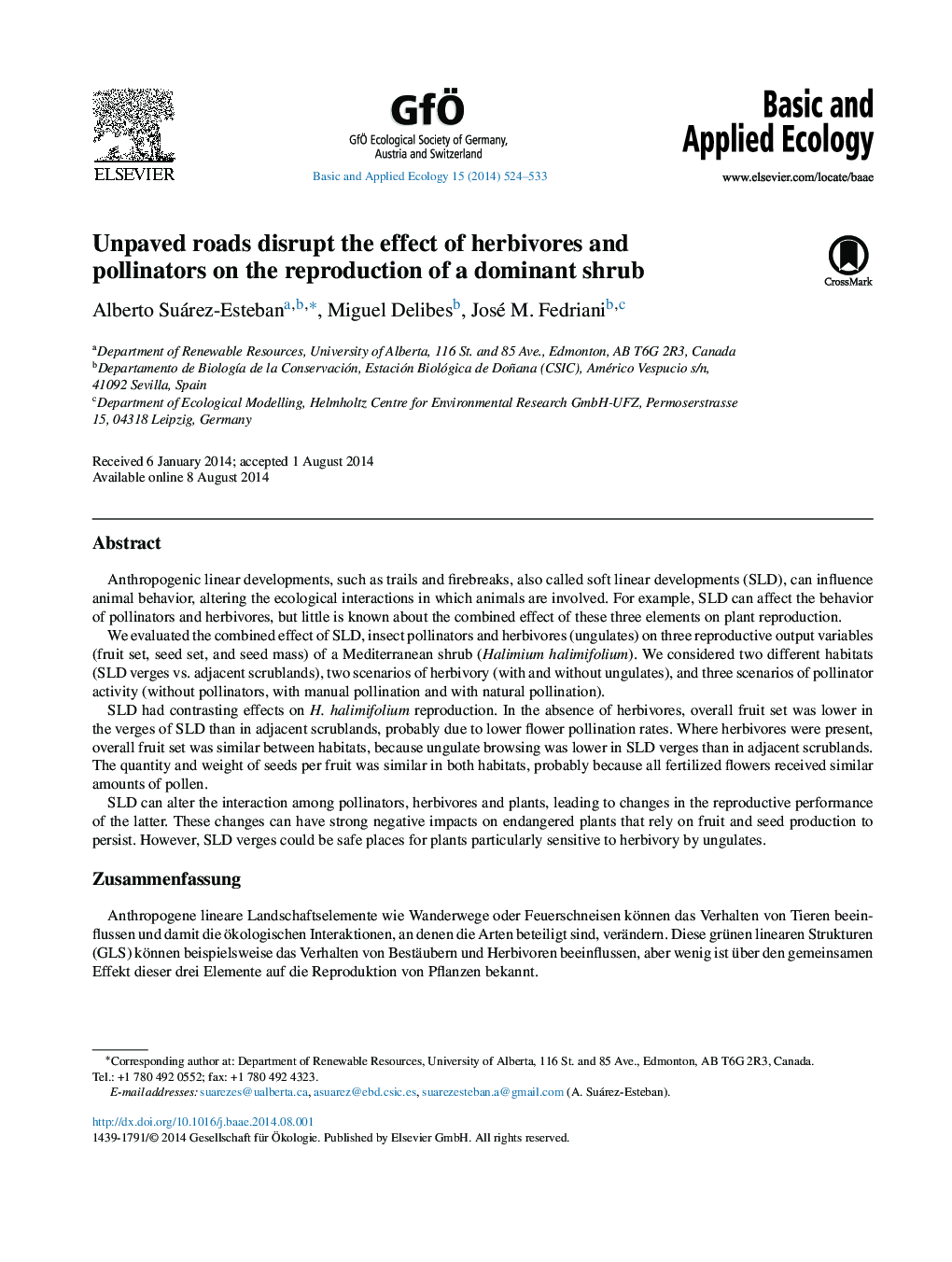 Unpaved roads disrupt the effect of herbivores and pollinators on the reproduction of a dominant shrub