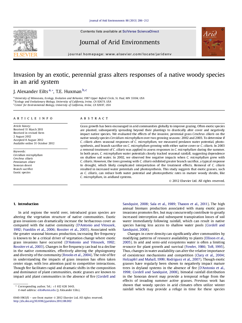 Invasion by an exotic, perennial grass alters responses of a native woody species in an arid system