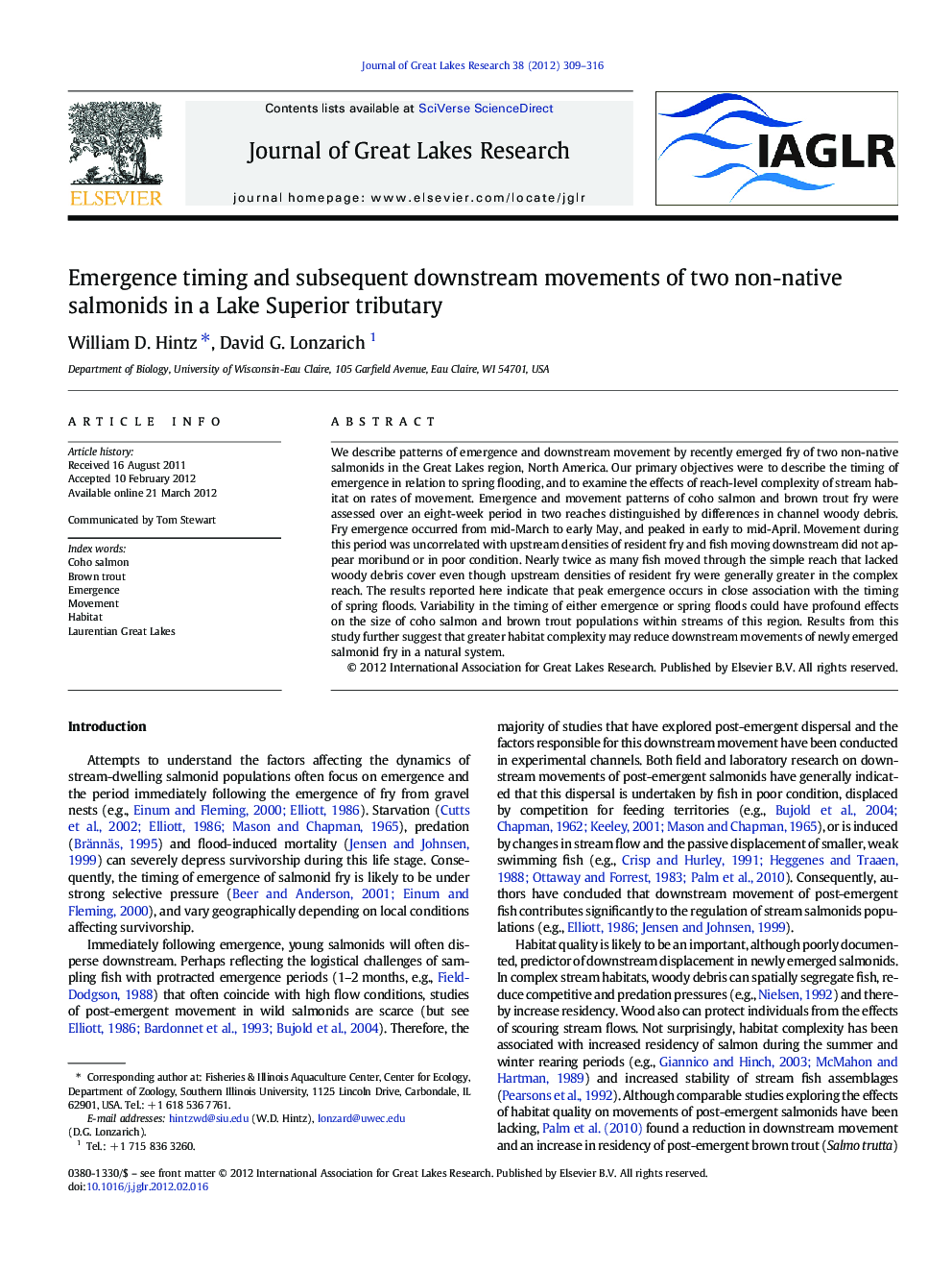 Emergence timing and subsequent downstream movements of two non-native salmonids in a Lake Superior tributary