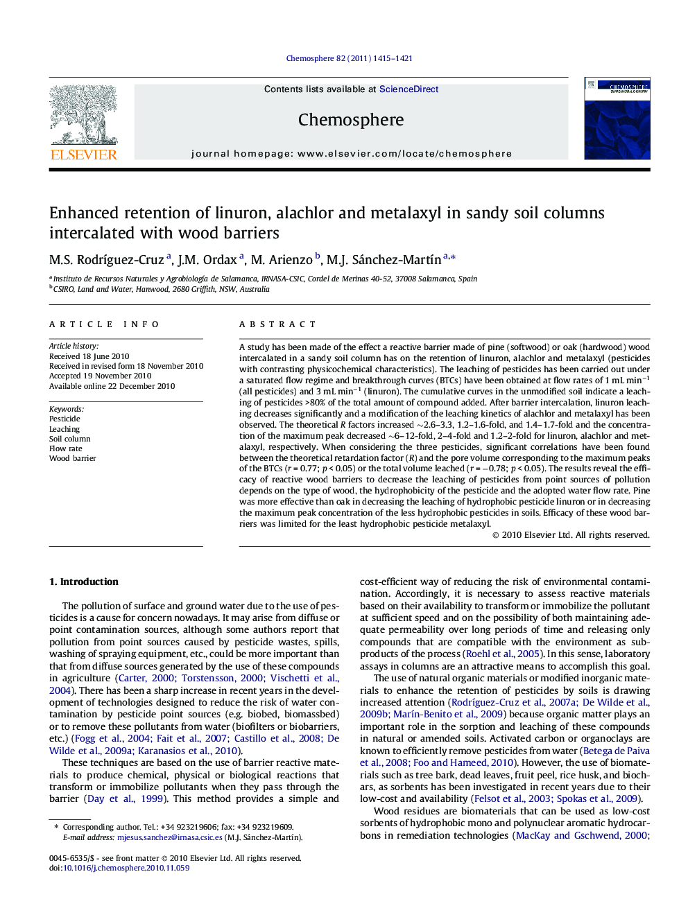 Enhanced retention of linuron, alachlor and metalaxyl in sandy soil columns intercalated with wood barriers