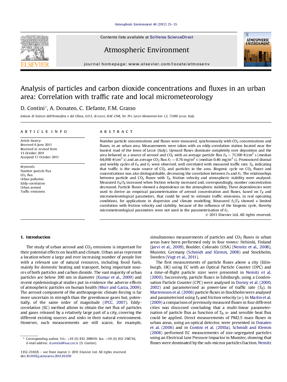 Analysis of particles and carbon dioxide concentrations and fluxes in an urban area: Correlation with traffic rate and local micrometeorology