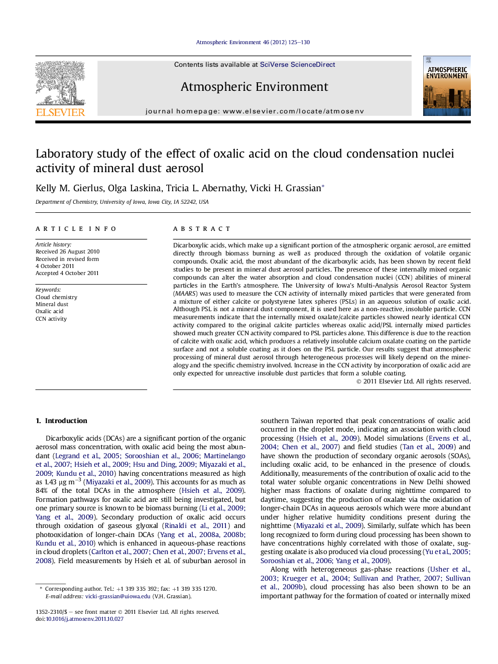 Laboratory study of the effect of oxalic acid on the cloud condensation nuclei activity of mineral dust aerosol