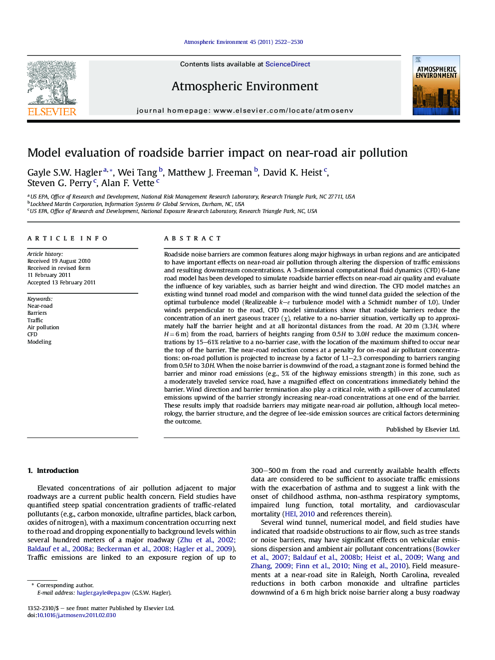 Model evaluation of roadside barrier impact on near-road air pollution