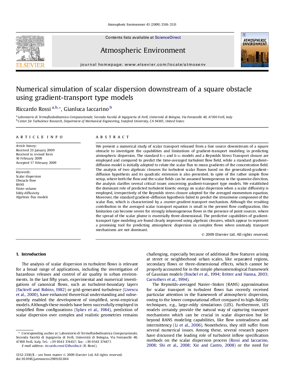 Numerical simulation of scalar dispersion downstream of a square obstacle using gradient-transport type models