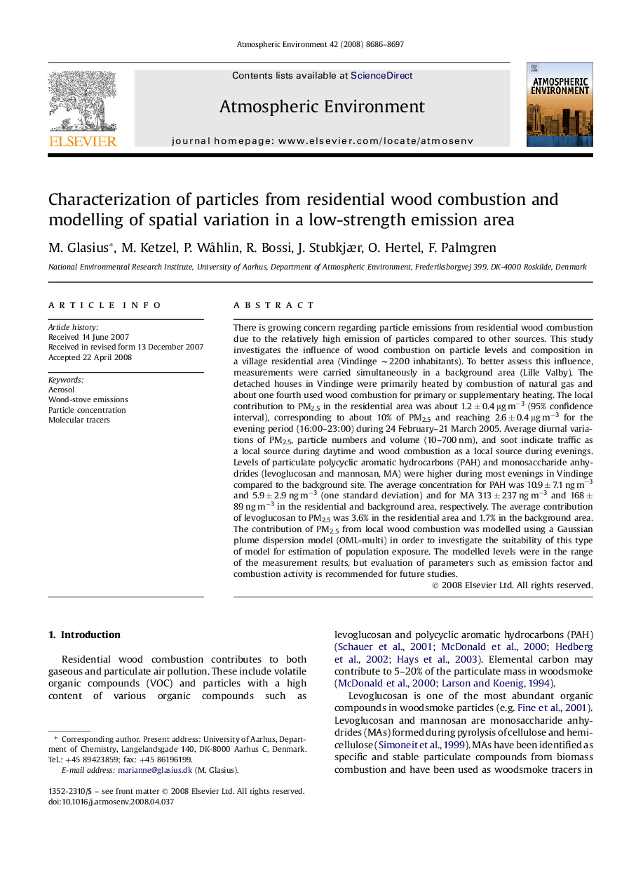 Characterization of particles from residential wood combustion and modelling of spatial variation in a low-strength emission area