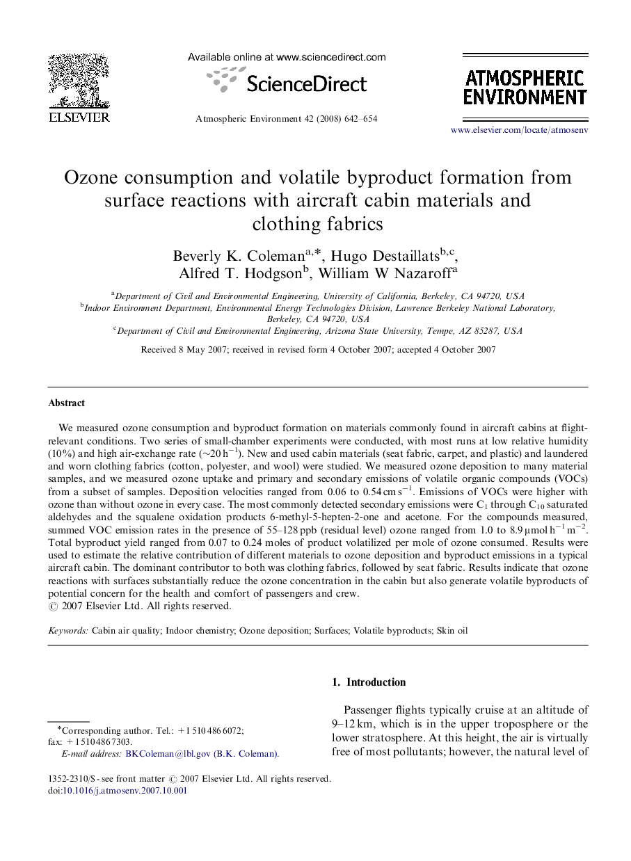 Ozone consumption and volatile byproduct formation from surface reactions with aircraft cabin materials and clothing fabrics