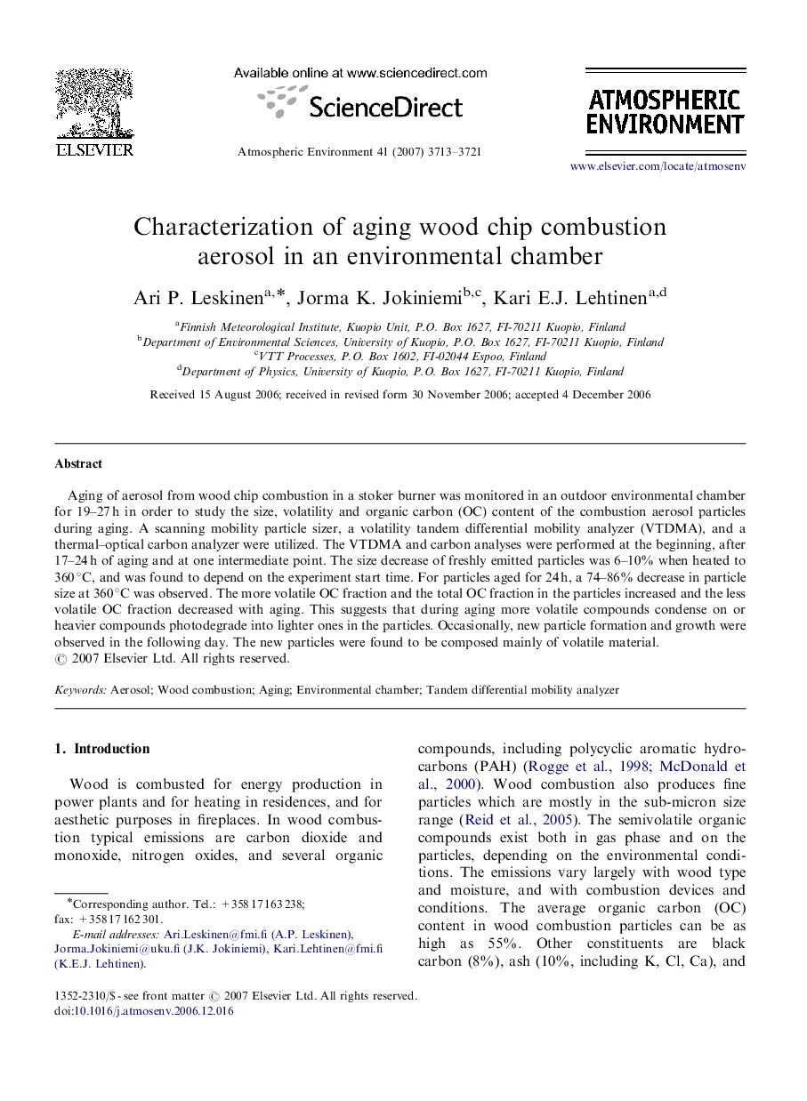 Characterization of aging wood chip combustion aerosol in an environmental chamber