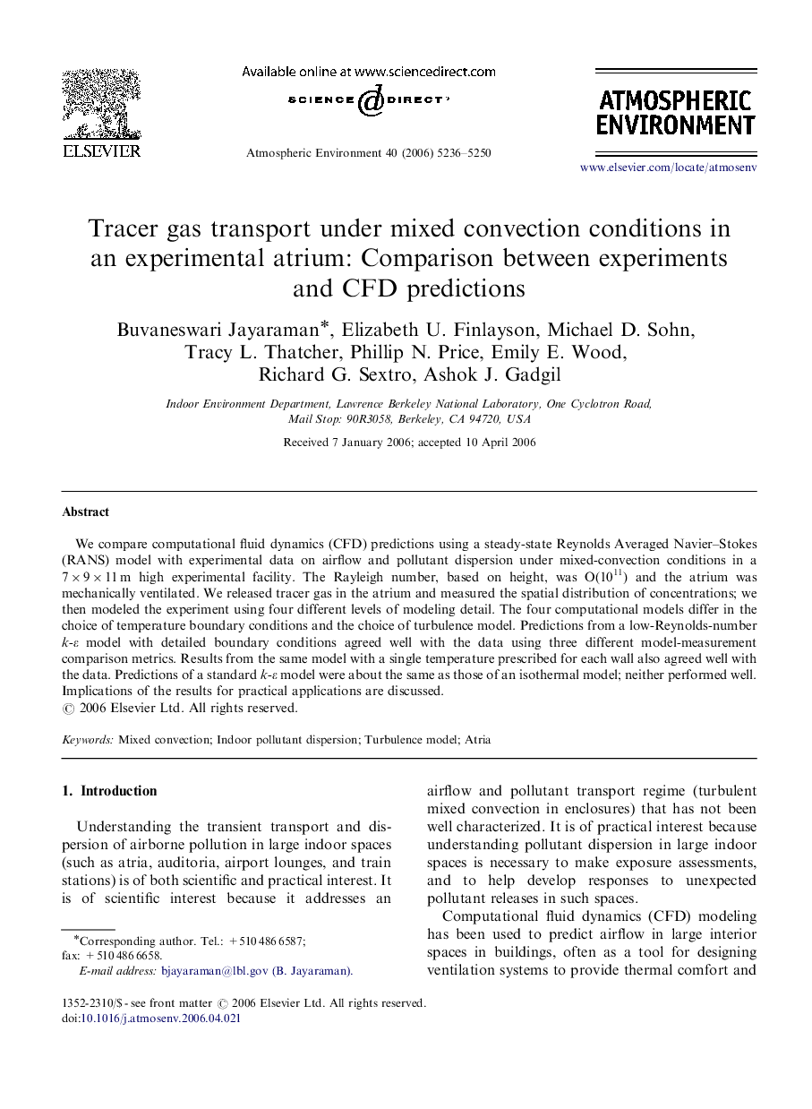 Tracer gas transport under mixed convection conditions in an experimental atrium: Comparison between experiments and CFD predictions