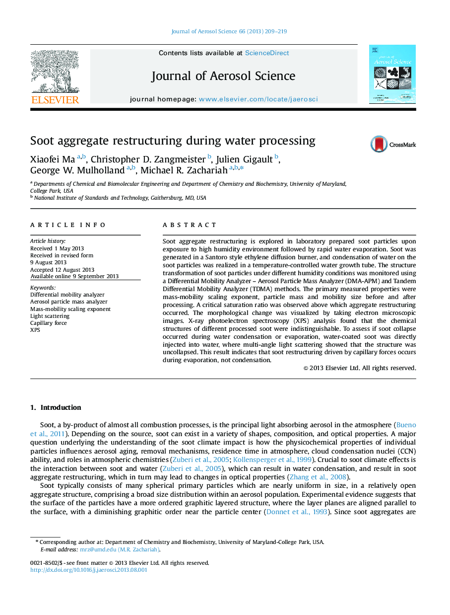 Soot aggregate restructuring during water processing