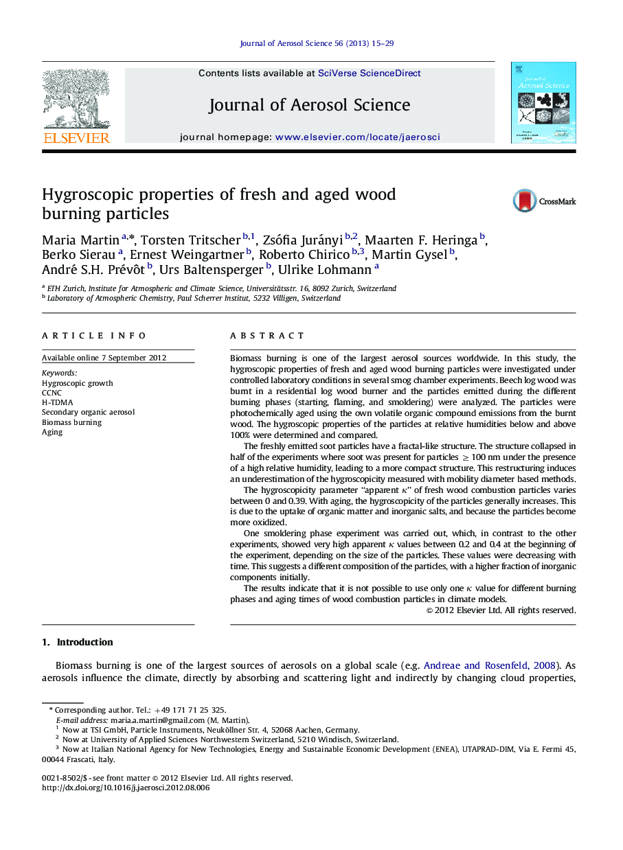 Hygroscopic properties of fresh and aged wood burning particles