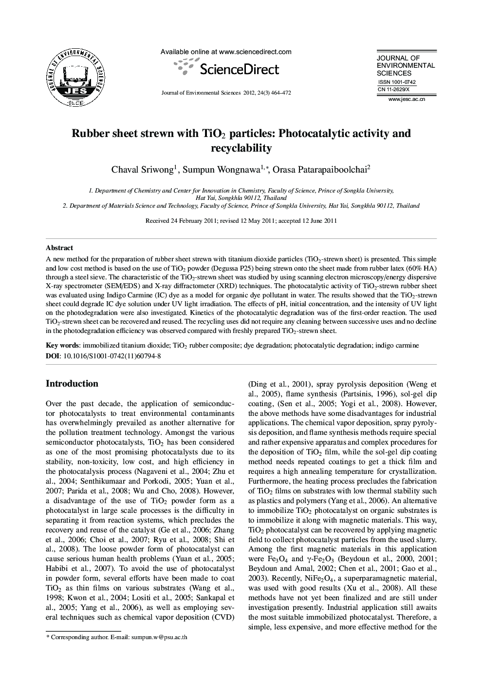 Rubber sheet strewn with TiO2 particles: Photocatalytic activity and recyclability