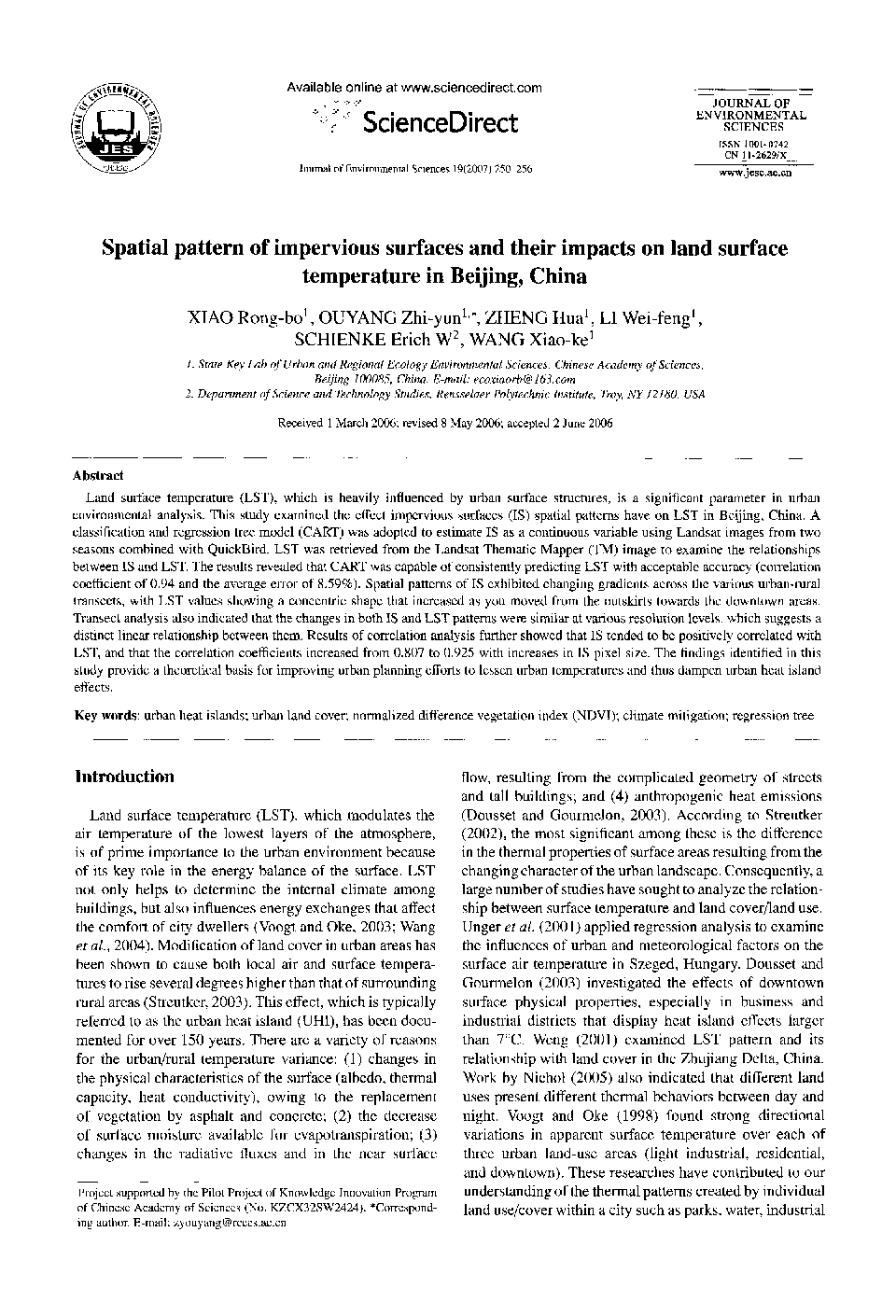 Spatial pattern of impervious surfaces and their impacts on land surface temperature in Beijing, China 
