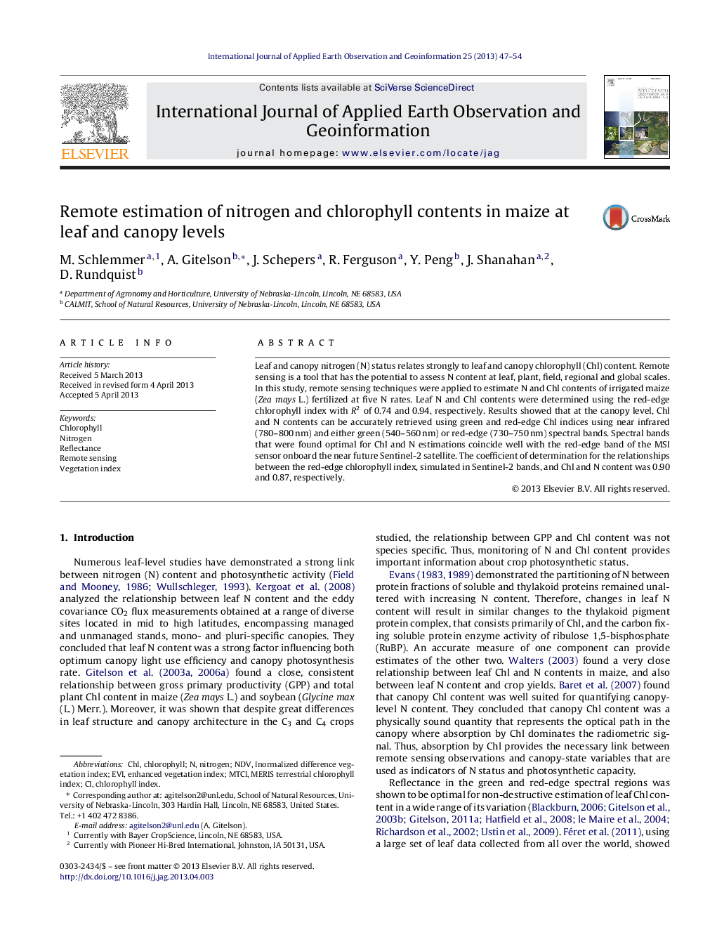 Remote estimation of nitrogen and chlorophyll contents in maize at leaf and canopy levels