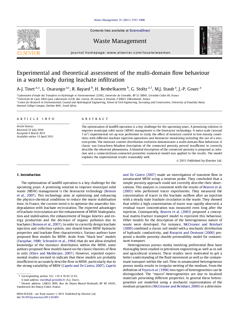 Experimental and theoretical assessment of the multi-domain flow behaviour in a waste body during leachate infiltration
