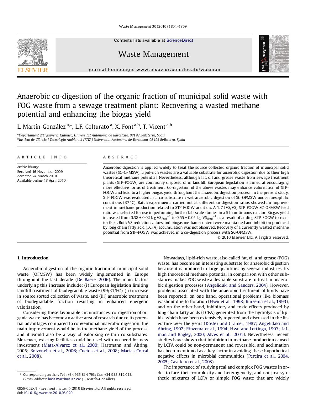 Anaerobic co-digestion of the organic fraction of municipal solid waste with FOG waste from a sewage treatment plant: Recovering a wasted methane potential and enhancing the biogas yield
