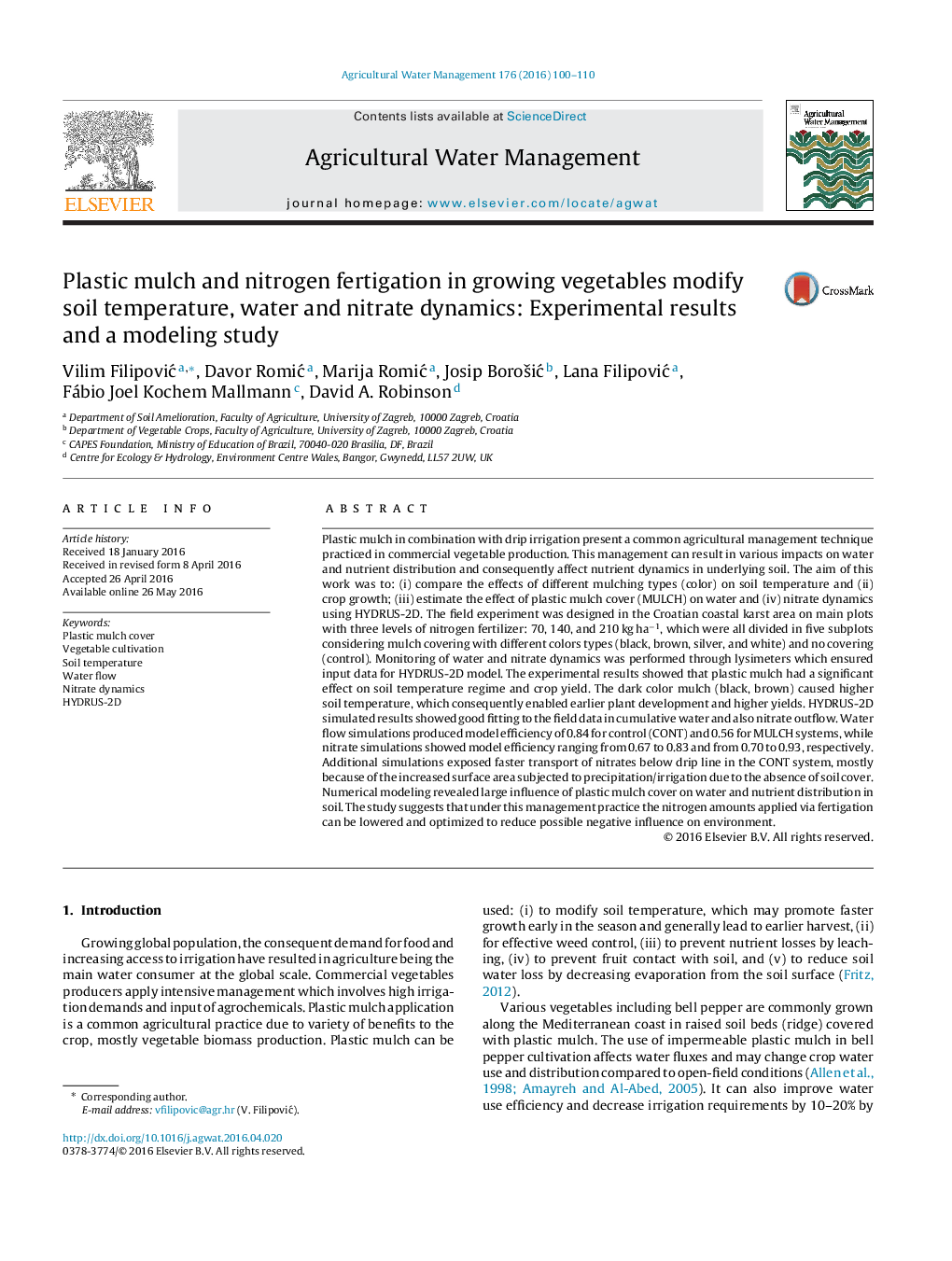 Plastic mulch and nitrogen fertigation in growing vegetables modify soil temperature, water and nitrate dynamics: Experimental results and a modeling study