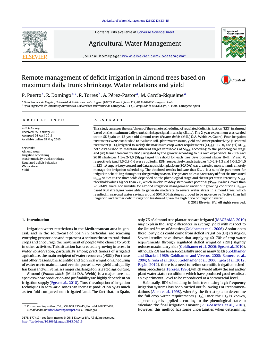 Remote management of deficit irrigation in almond trees based on maximum daily trunk shrinkage. Water relations and yield