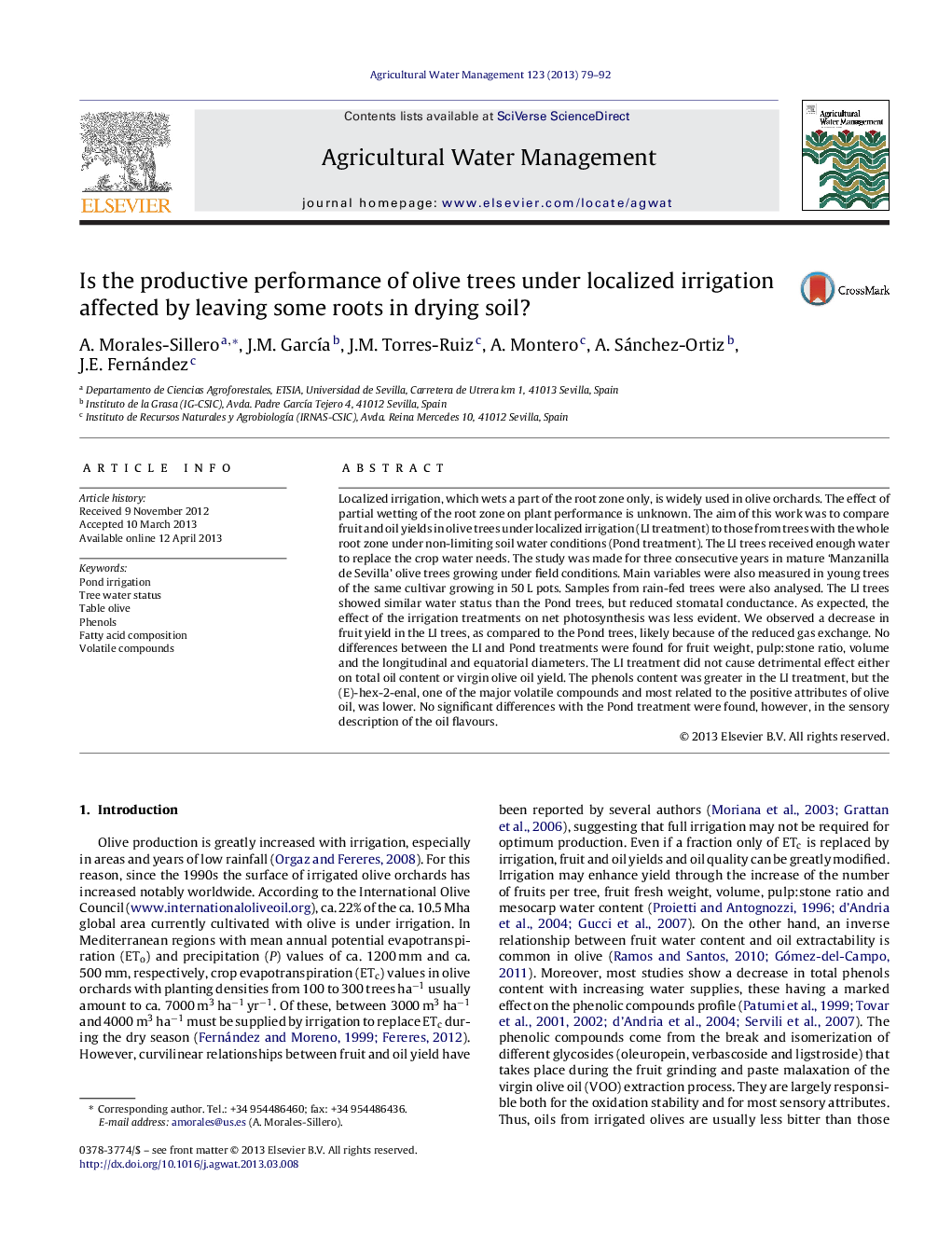 Is the productive performance of olive trees under localized irrigation affected by leaving some roots in drying soil?