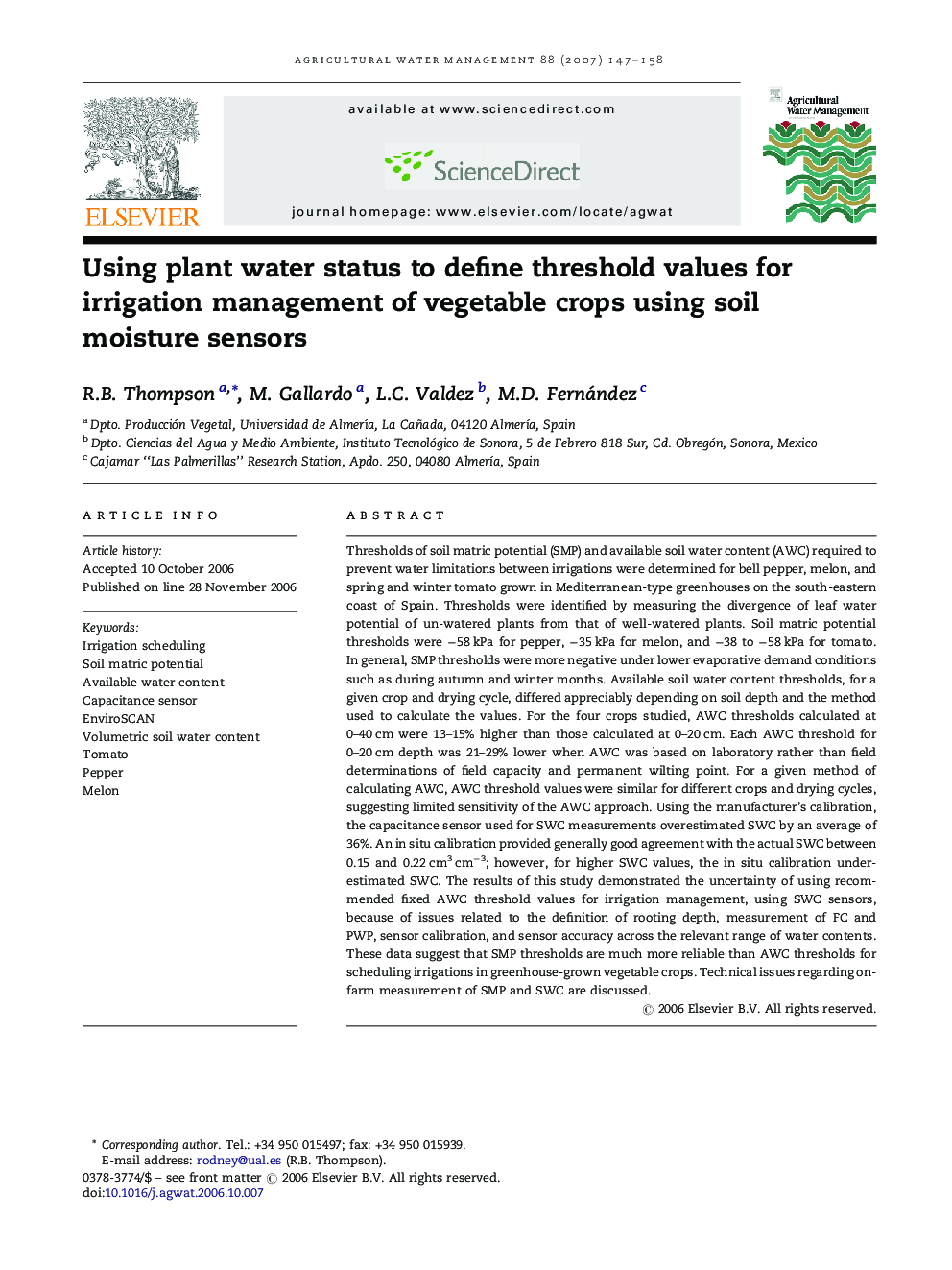 Using plant water status to define threshold values for irrigation management of vegetable crops using soil moisture sensors