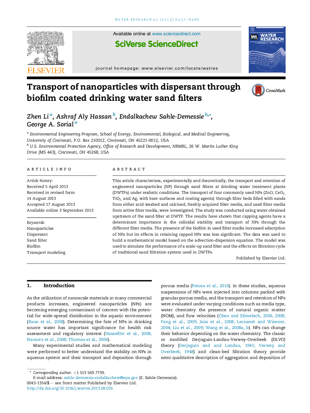 Transport of nanoparticles with dispersant through biofilm coated drinking water sand filters