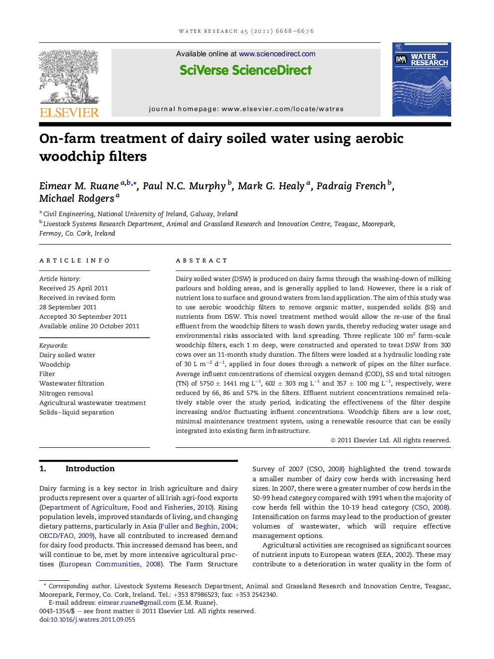 On-farm treatment of dairy soiled water using aerobic woodchip filters