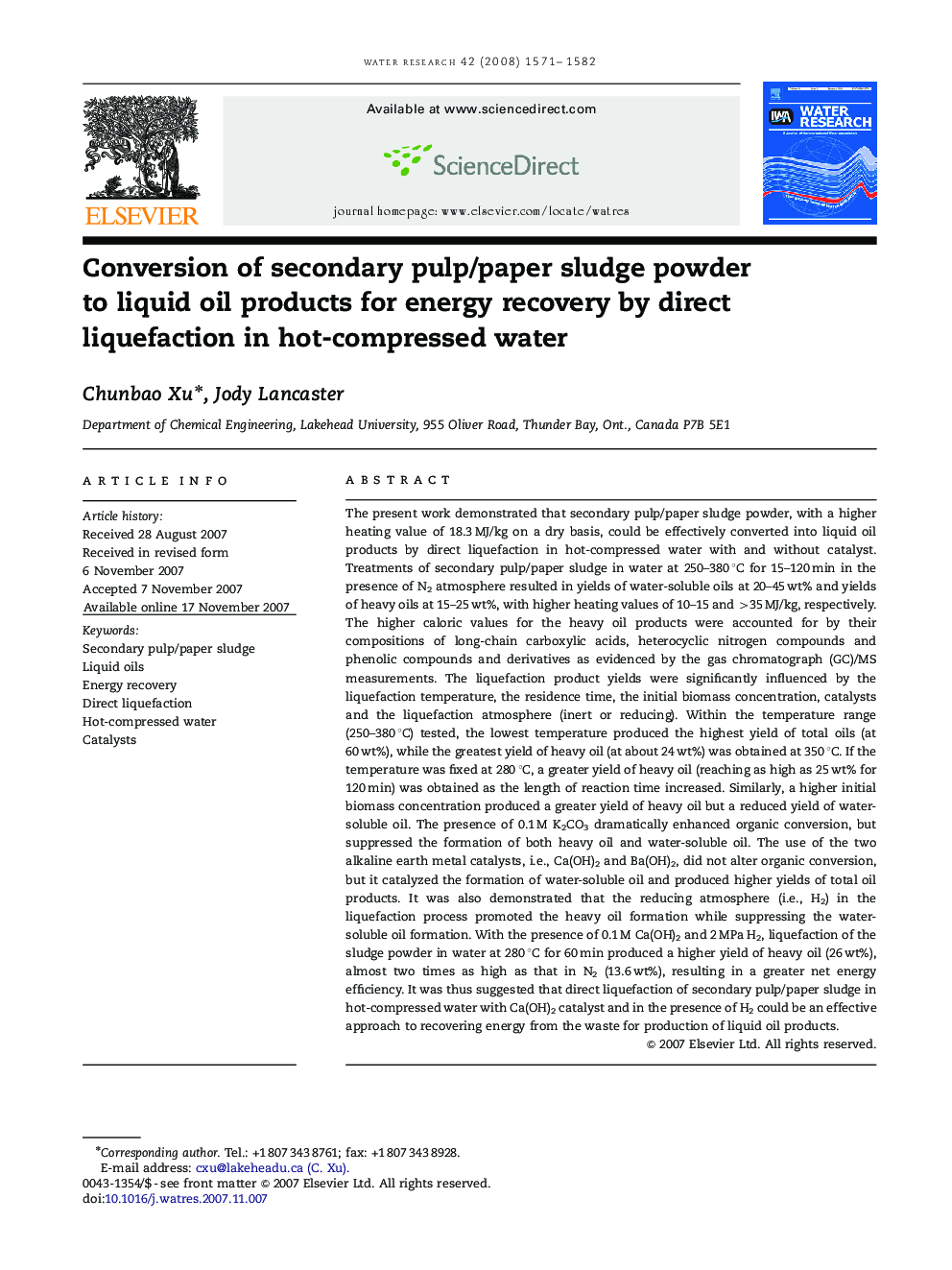 Conversion of secondary pulp/paper sludge powder to liquid oil products for energy recovery by direct liquefaction in hot-compressed water