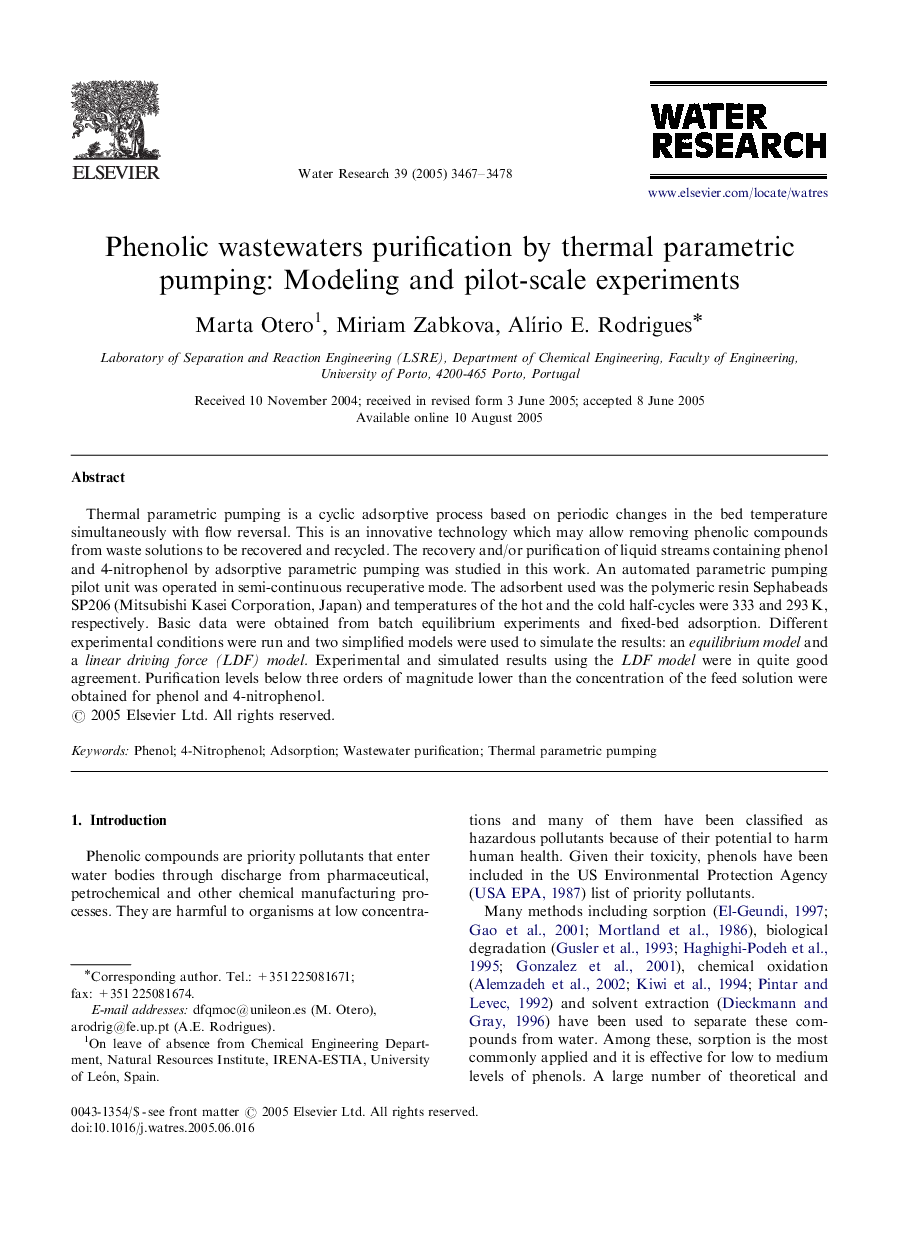 Phenolic wastewaters purification by thermal parametric pumping: Modeling and pilot-scale experiments