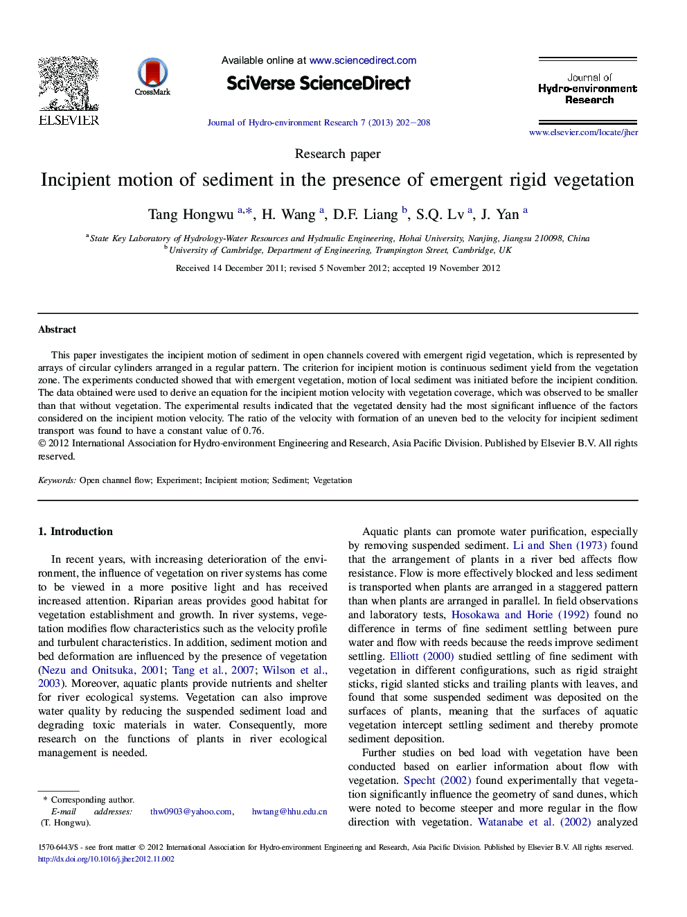 Incipient motion of sediment in the presence of emergent rigid vegetation