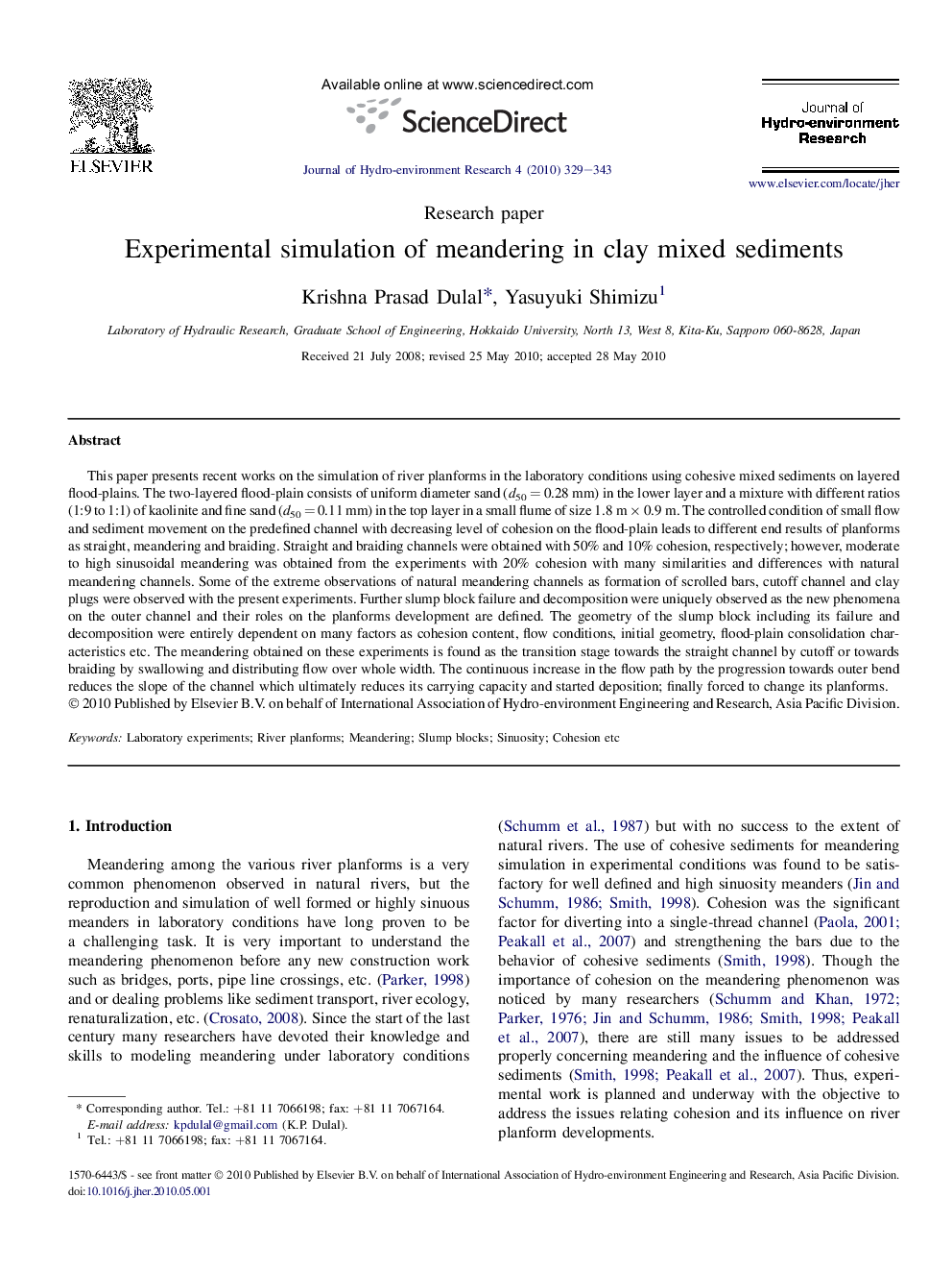 Experimental simulation of meandering in clay mixed sediments