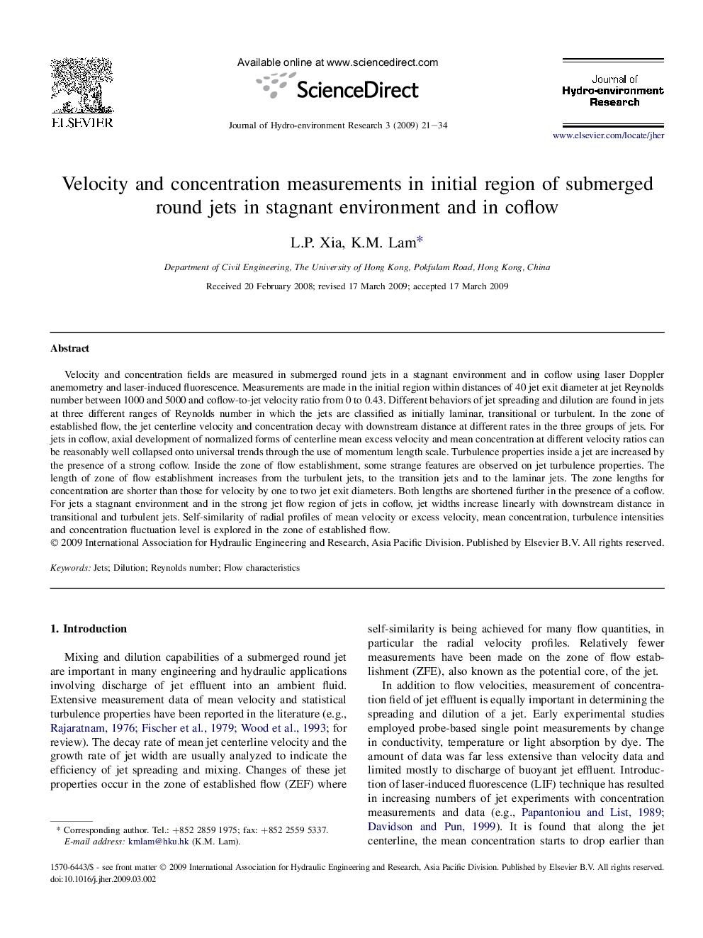 Velocity and concentration measurements in initial region of submerged round jets in stagnant environment and in coflow