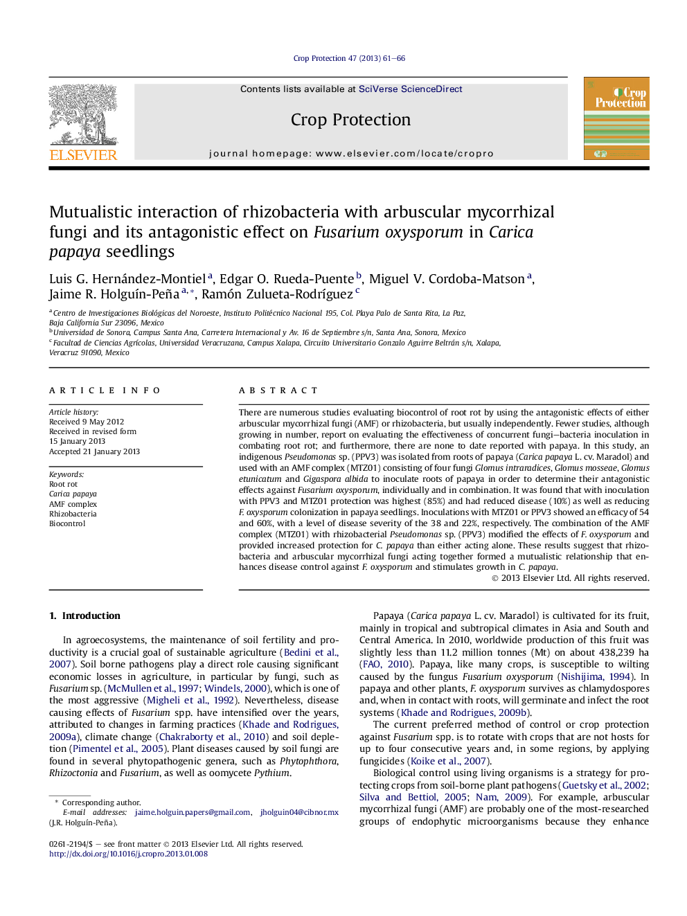 Mutualistic interaction of rhizobacteria with arbuscular mycorrhizal fungi and its antagonistic effect on Fusarium oxysporum in Carica papaya seedlings