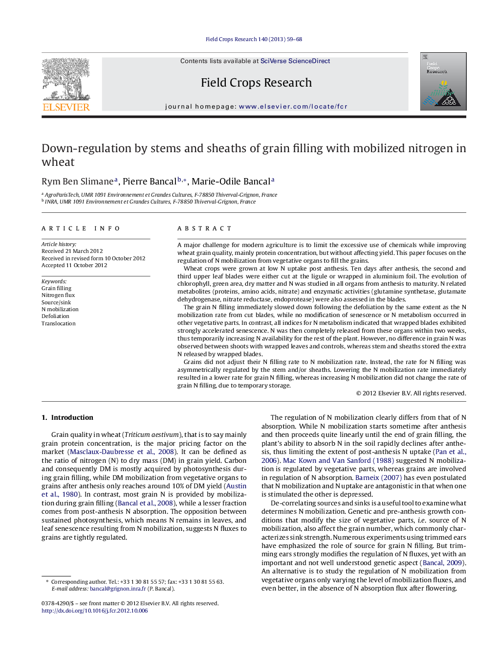 Down-regulation by stems and sheaths of grain filling with mobilized nitrogen in wheat