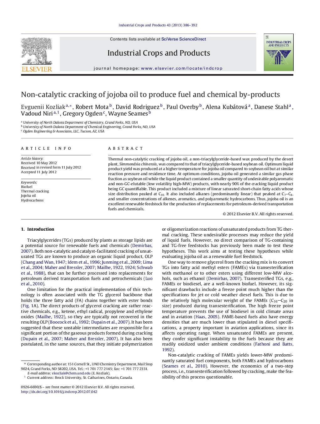 Non-catalytic cracking of jojoba oil to produce fuel and chemical by-products