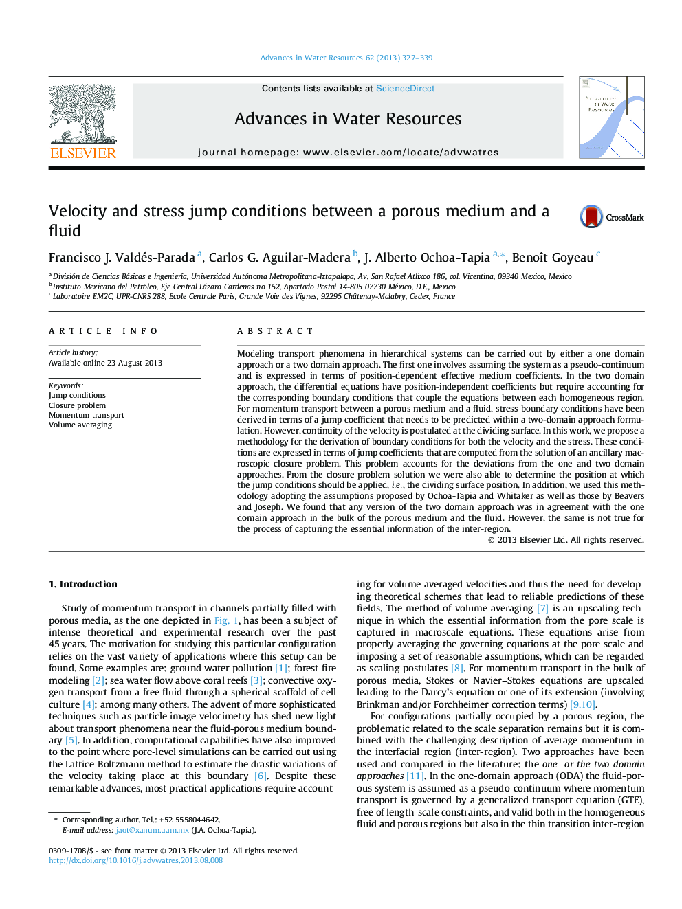 Velocity and stress jump conditions between a porous medium and a fluid