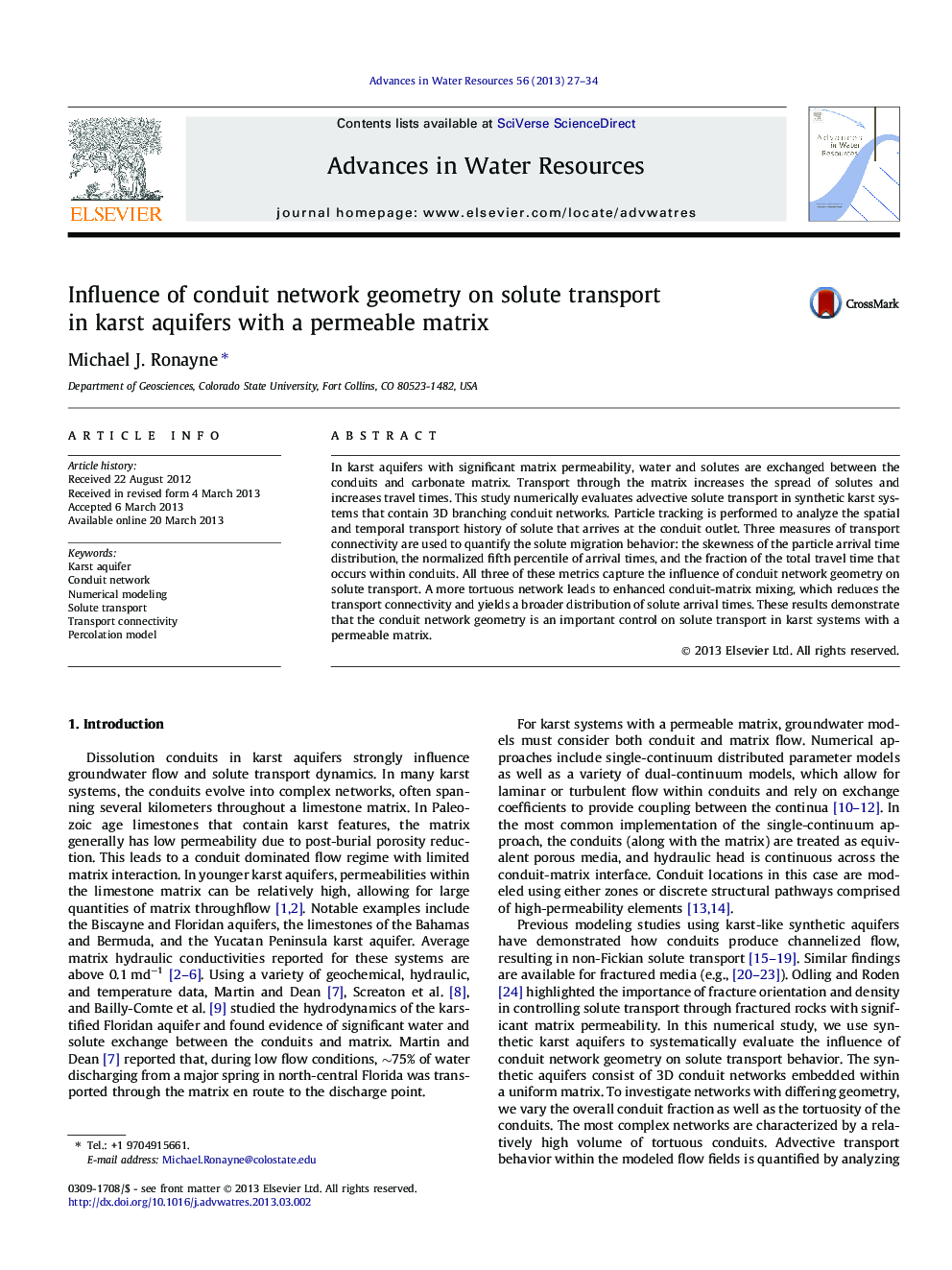 Influence of conduit network geometry on solute transport in karst aquifers with a permeable matrix