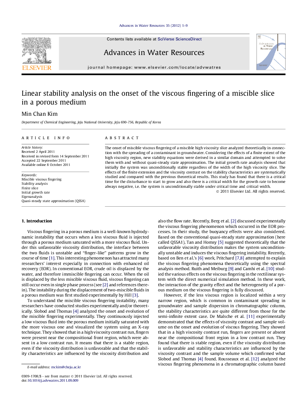 Linear stability analysis on the onset of the viscous fingering of a miscible slice in a porous medium