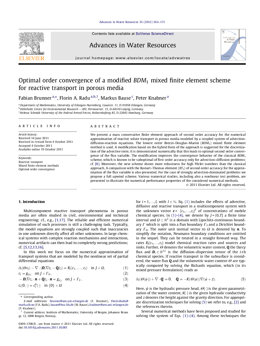 Optimal order convergence of a modified BDM1 mixed finite element scheme for reactive transport in porous media