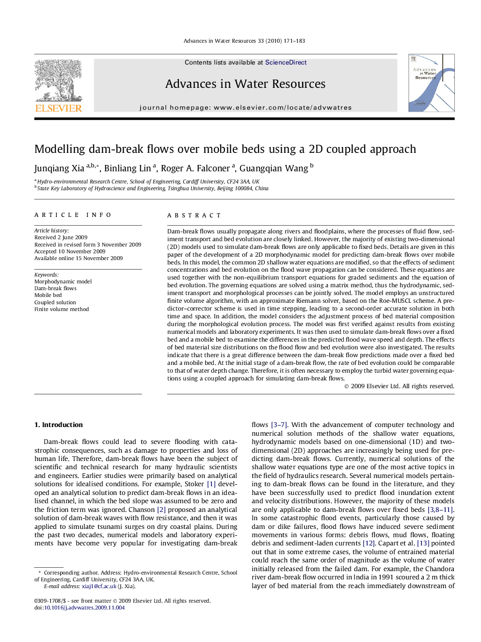 Modelling dam-break flows over mobile beds using a 2D coupled approach