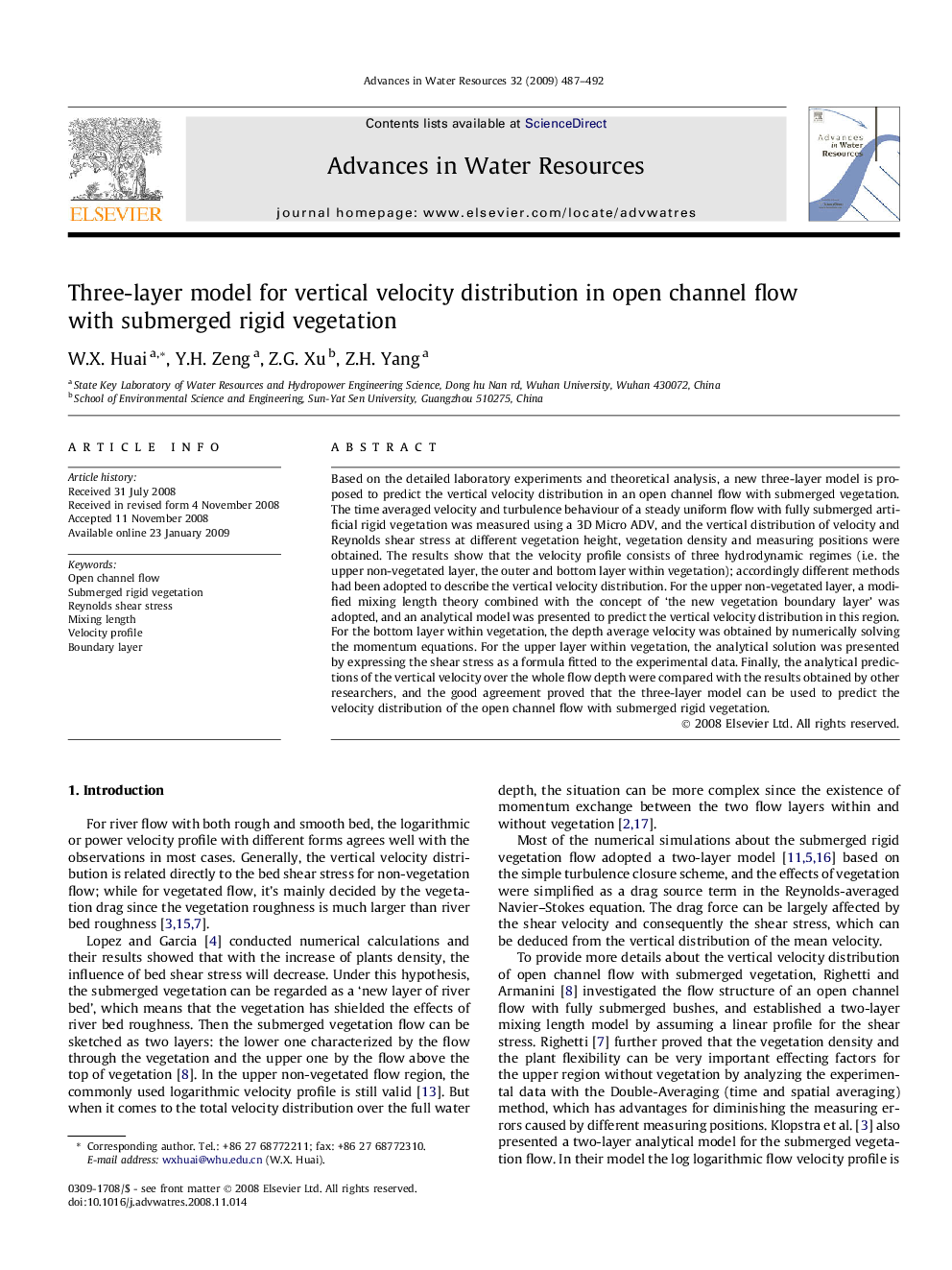 Three-layer model for vertical velocity distribution in open channel flow with submerged rigid vegetation