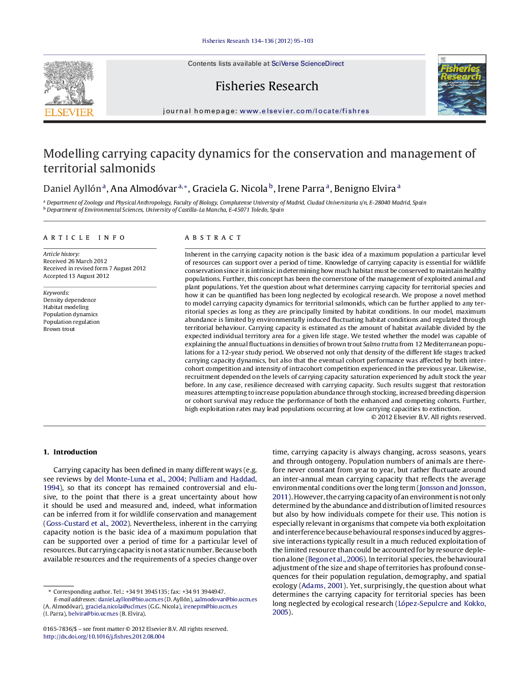 Modelling carrying capacity dynamics for the conservation and management of territorial salmonids