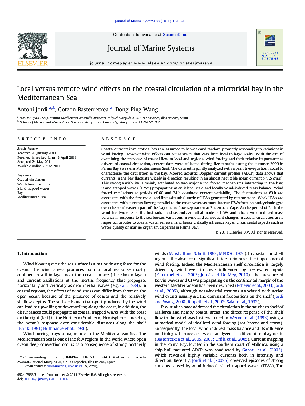 Local versus remote wind effects on the coastal circulation of a microtidal bay in the Mediterranean Sea