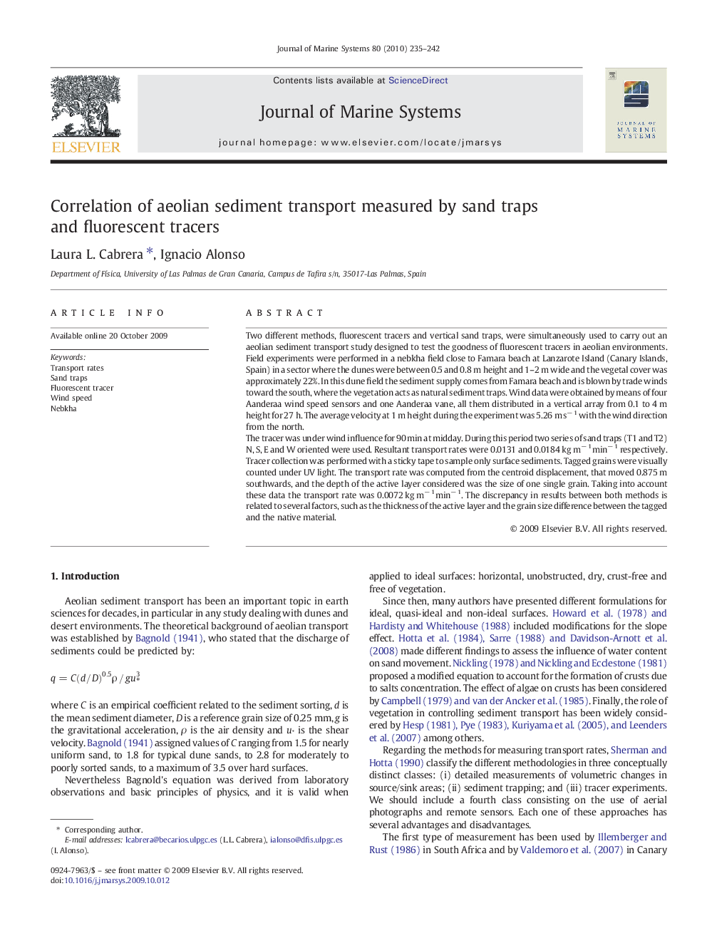 Correlation of aeolian sediment transport measured by sand traps and fluorescent tracers