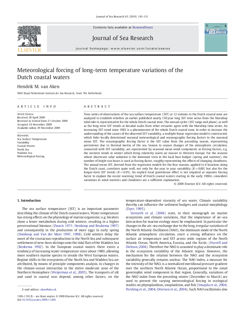 Meteorological forcing of long-term temperature variations of the Dutch coastal waters