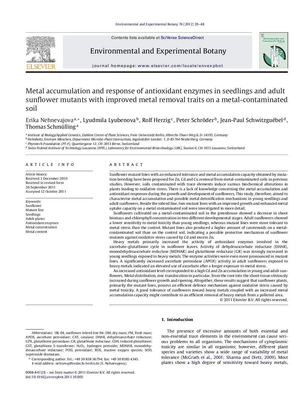 Metal accumulation and response of antioxidant enzymes in seedlings and adult sunflower mutants with improved metal removal traits on a metal-contaminated soil