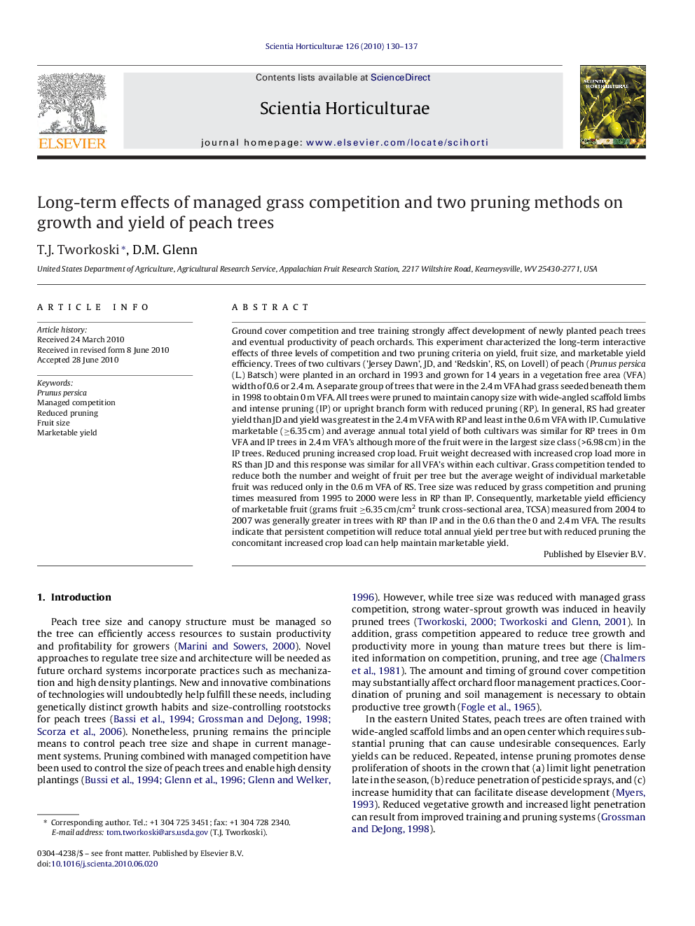 Long-term effects of managed grass competition and two pruning methods on growth and yield of peach trees