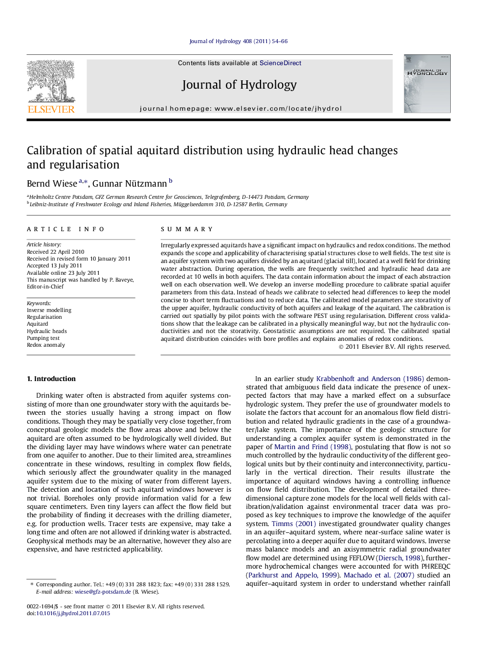 Calibration of spatial aquitard distribution using hydraulic head changes and regularisation