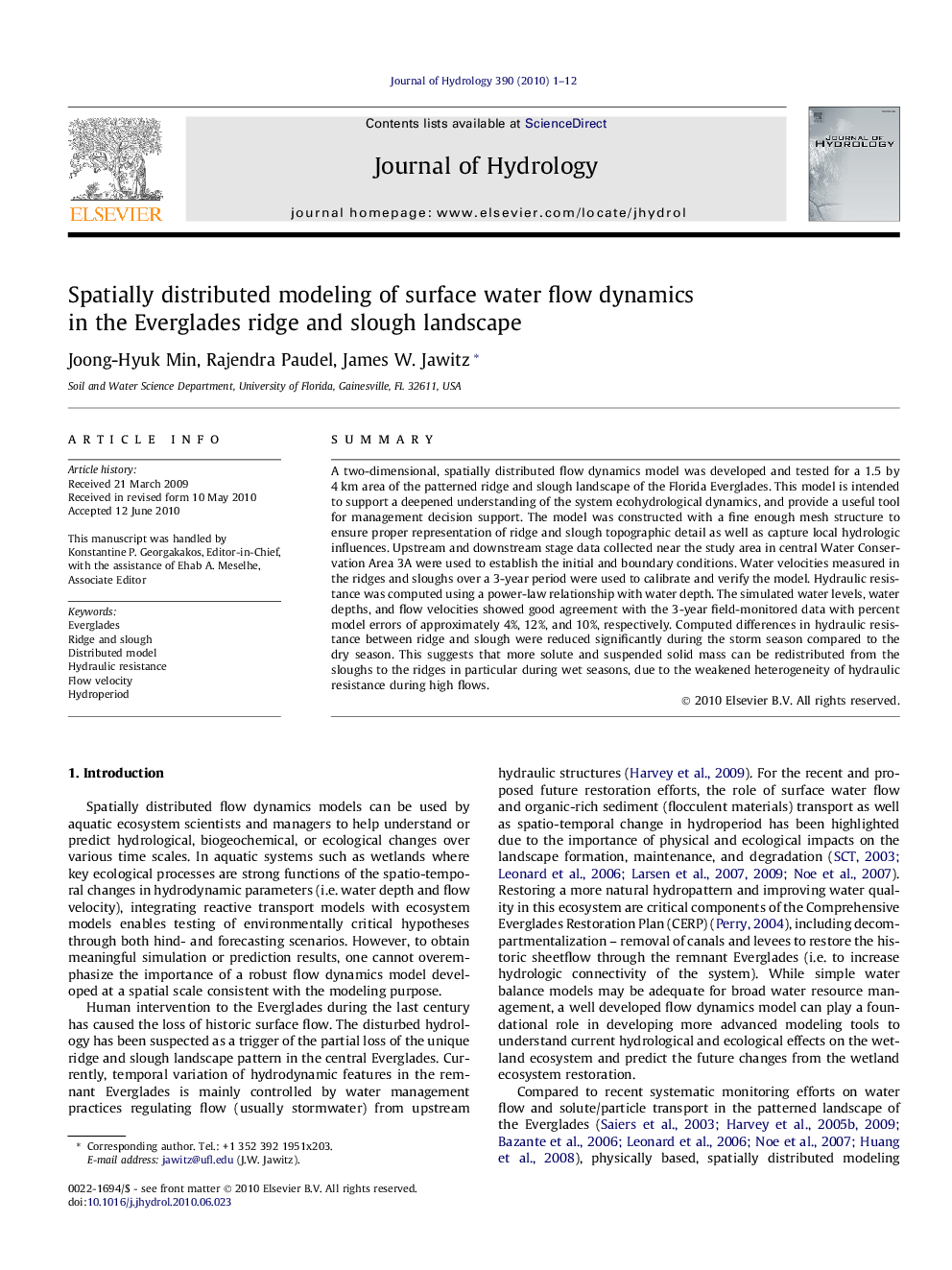 Spatially distributed modeling of surface water flow dynamics in the Everglades ridge and slough landscape